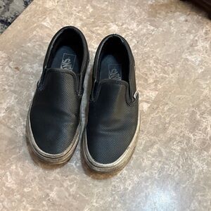 Vans women’s Black Perforated Slip-On Sneakers